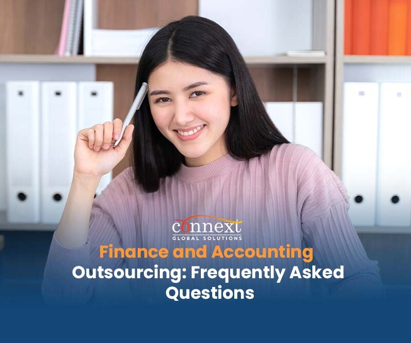Finance and Accounting Outsourcing Frequently Asked Questions accountant with accounting books - Copy