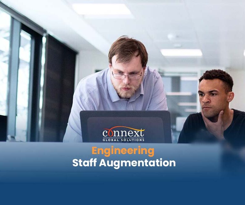 Engineering Staff Augmentation caucasian latino working inside office with laptop