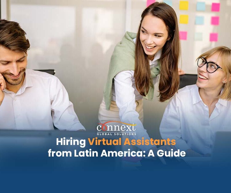 Hiring-Virtual-Assistants-from-Latin-America-A-Guide-3-happy-people-caucasian-meeting-in-office-with-cellphone-and-computers-1@1x_1