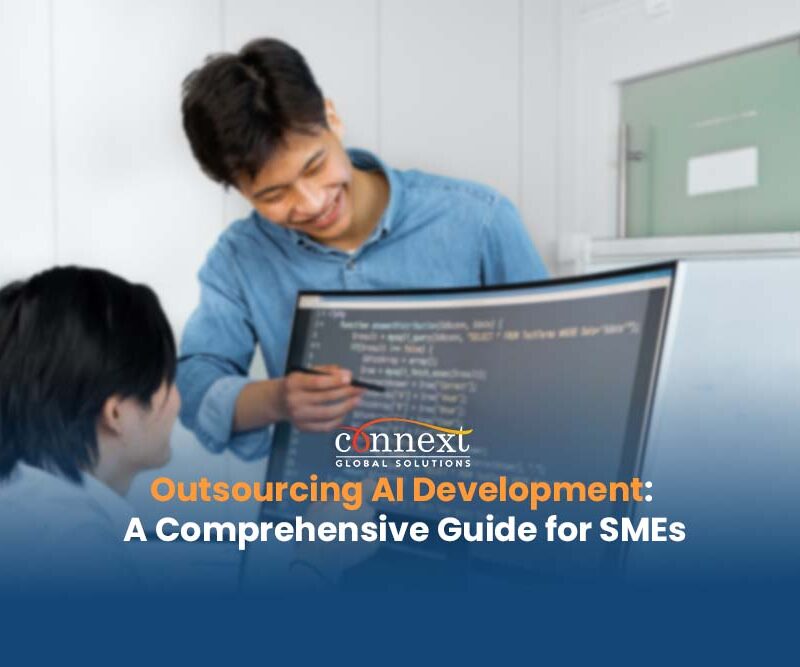 Outsourcing AI Development A Comprehensive Guide for SMEs 2 asian developers coding using computer