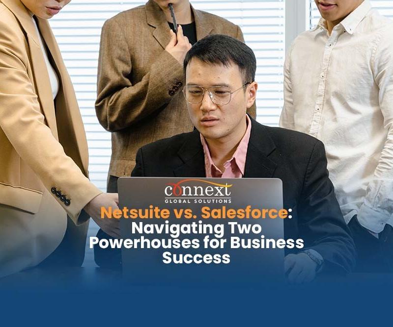 Netsuite-vs.-Salesforce-Navigating-Two-Powerhouses-for-Business-Success-man-in-corporate-attire-working-with-computer-writing-in-office