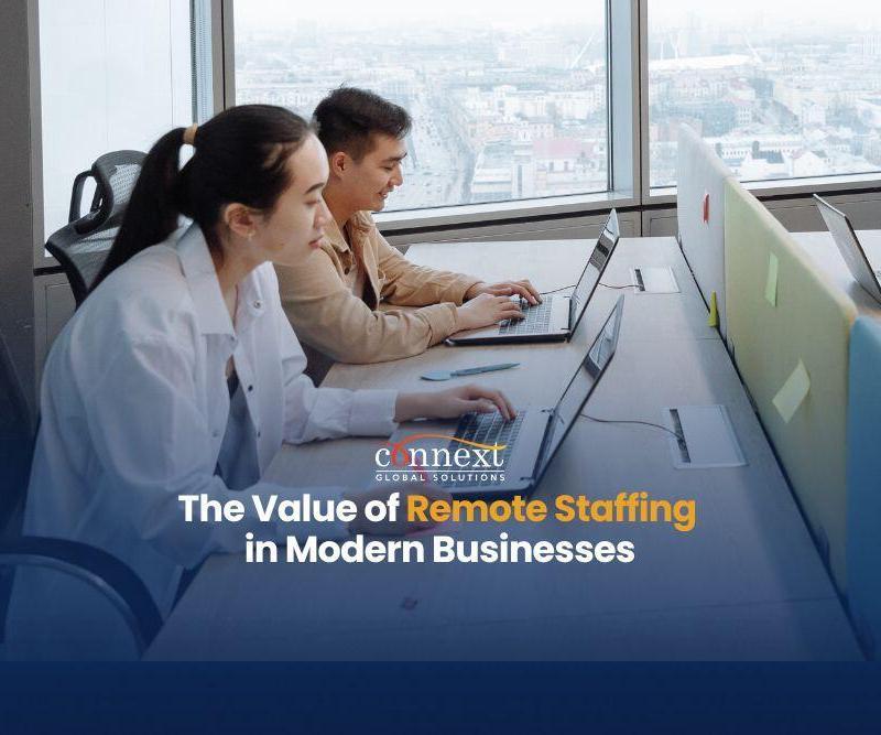 The-value-of-remote-staffing-in-modern-businesses-asian-man-and-woman-sitting-at-desk-with-laptops-in-office