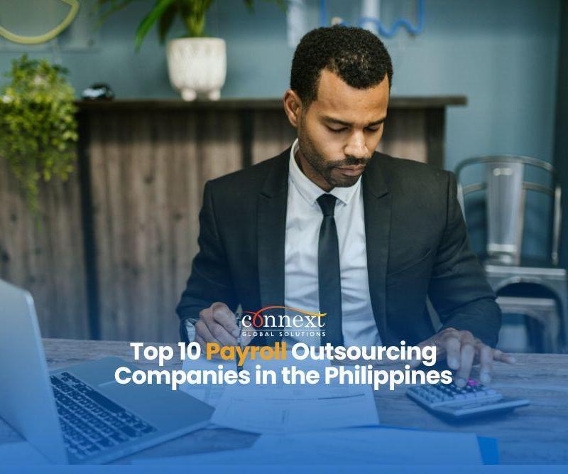 Top-10-Payroll-Outsourcing-Companies-in-the-Philippines-man-in-corporate-attire-suit-and-necktie-with-laptop-and-calculator-working-in-office