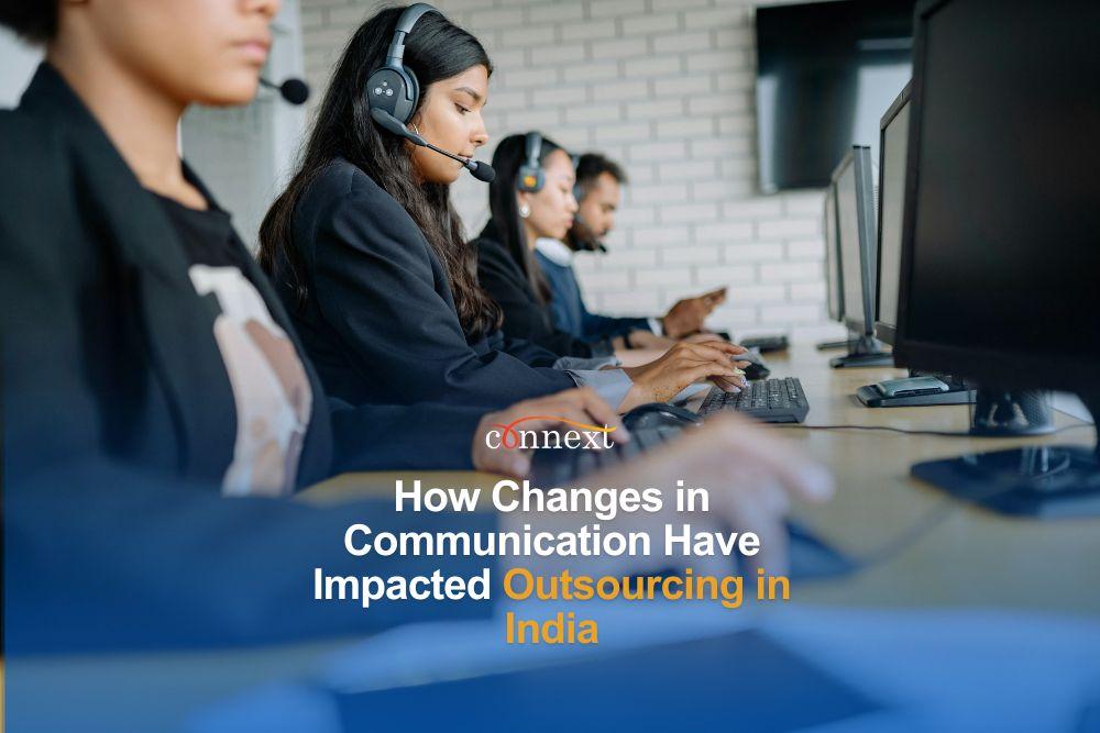 How Changes in Communication Have Impacted Outsourcing in India staff in corporate attire wearing headset in office